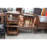 A reproduction burr walnut coffee table together with a similar nest of tables,