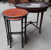 An Edwardian tray top occasional table and nest of two tables