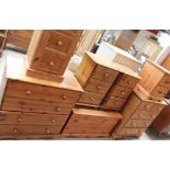 A Pine coffer together with a pair of pine bedside cabinets,