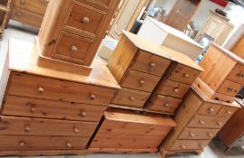 A Pine coffer together with a pair of pine bedside cabinets,