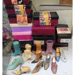 A collection of 'Raine' model shoes with boxes