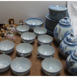 A Japanese blue and white part tea service together with a Beswick Miss Moppet figure,