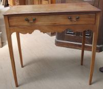 A 19th century mahogany side table with a rectangular crossbanded top above a single drawer and a