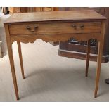A 19th century mahogany side table with a rectangular crossbanded top above a single drawer and a