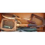 A Wilson Jack Kramer tennis racket together with other tennis and badminton rackets