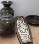 Two studio pottery vases together with a long studio pottery dish a charger