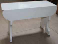 A white painted stool