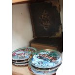 Six collectors plates together with two leather bound bibles