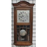 A 20th century oak wall clock,