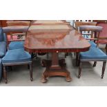 A 19th century mahogany supper table together with a set of four Regency mahogany dining chairs