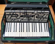 A Hohner Verdi III piano accordion,