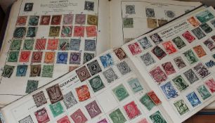 Two stamp albums and assorted stamps