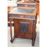 An Edwardian walnut Davenport,