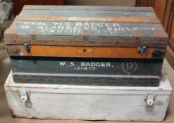 A pine bound tool trunk together with a painted steel trunk and tools