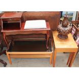 A teak nest of tables together with a telephone table,