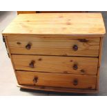 A 20th century pine chest of drawers