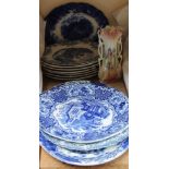 Assorted blue and white plates,