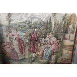 A Belgian tapestry wall hanging depicting ladies and a gentleman on a veranda with a lake in the