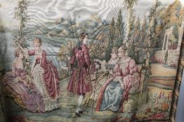 A Belgian tapestry wall hanging depicting ladies and a gentleman on a veranda with a lake in the