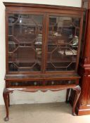 A 20th century mahogany display cabinet,