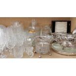 Assorted crystal drinking glasses together with a decanter, glass vases,