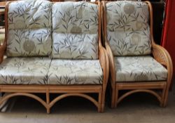 An upholstered and wicker conservatory suite