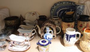 A Chinese blue and white charger together with blue and white pottery and porcelain, sauce tureens,