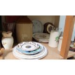 A stoneware storage jar together with assorted plates, barometer, clock,