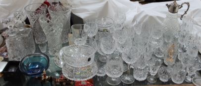 An electroplated and cut glass claret jug together with crystal drinking glasses, decanters, vases,