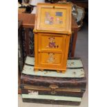 A tin trunk together with a child's bureau