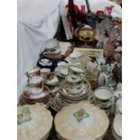A Royal Doulton part tea service together with Johnson Brothers tureens and covers,