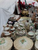 A Royal Doulton part tea service together with Johnson Brothers tureens and covers,