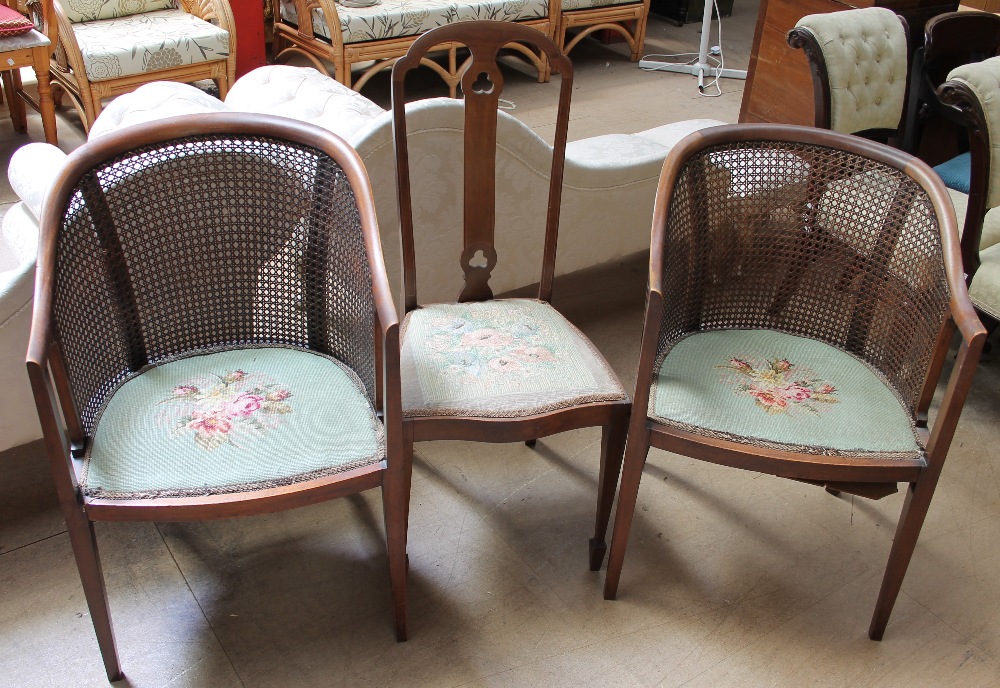 A pair of bergère elbow chairs on square tapering legs together with an Edwardian mahogany salon