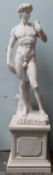 A simulated white marble statue of David on a square base 164cm high