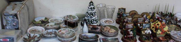 A large lot including collectors plates, Christmas figures, sewing accoutrements,