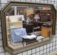 A green and gilt wall mirror together with a woolwork picture and a folding card table