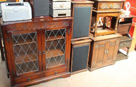 An oak display cabinet together with an oak hifi cabinet, speaker cabinets, television cabinet,