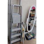 A Taskmaster aluminium extending ladder together with a step ladder, tools, vice, garden chairs,