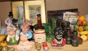 A set of five Natwest piggy banks together with a Nao figure, prints, brass wares, negro money box,