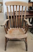 A 19th century kitchen slat back elbow chair