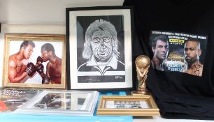 A Joe Calzaghe vs Jones signed t-shirt together with boxing photographs, RIVA signed statue,