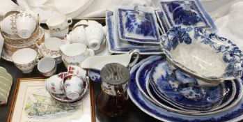 A Flo blue part dinner service together with a Royal Malvern pattern part tea set,