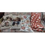 A collection of cushions decorated with dogs,