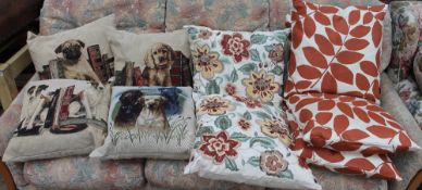 A collection of cushions decorated with dogs,