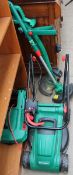 A Qualcast lawn mower together with two strimmers (Sold as seen,