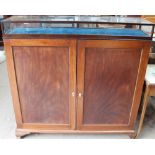 A mahogany side cabinet with a display cabinet applied to the top