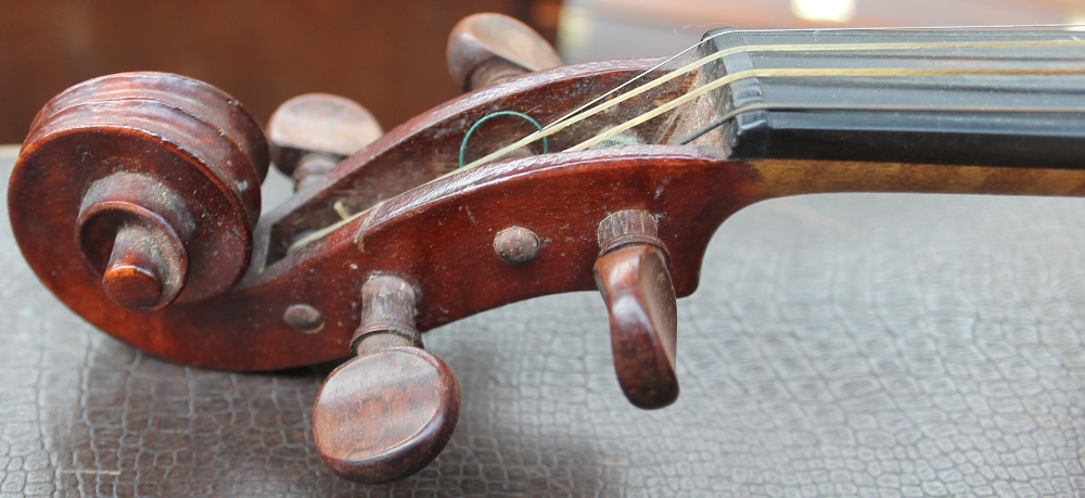 A violin with a two piece back and ebonised stringing, bears a label “Dulcis et Fortis”, - Image 2 of 4