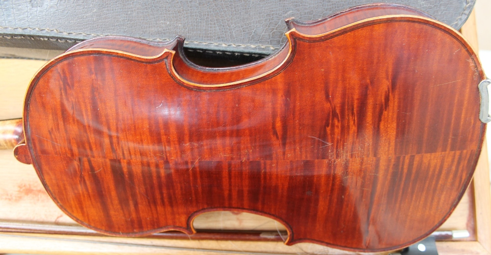 A violin with a two piece back and ebonised stringing, bears a label “Dulcis et Fortis”, - Image 4 of 4