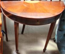 A reproduction mahogany D shaped side table with a fan decoration and a single drawer on square