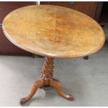 A Victorian walnut tripod table,